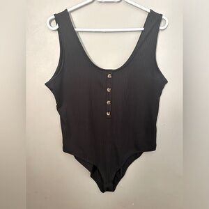3/$25-H&M black ribbed button down bodysuit with snap closure. Women’s size XL